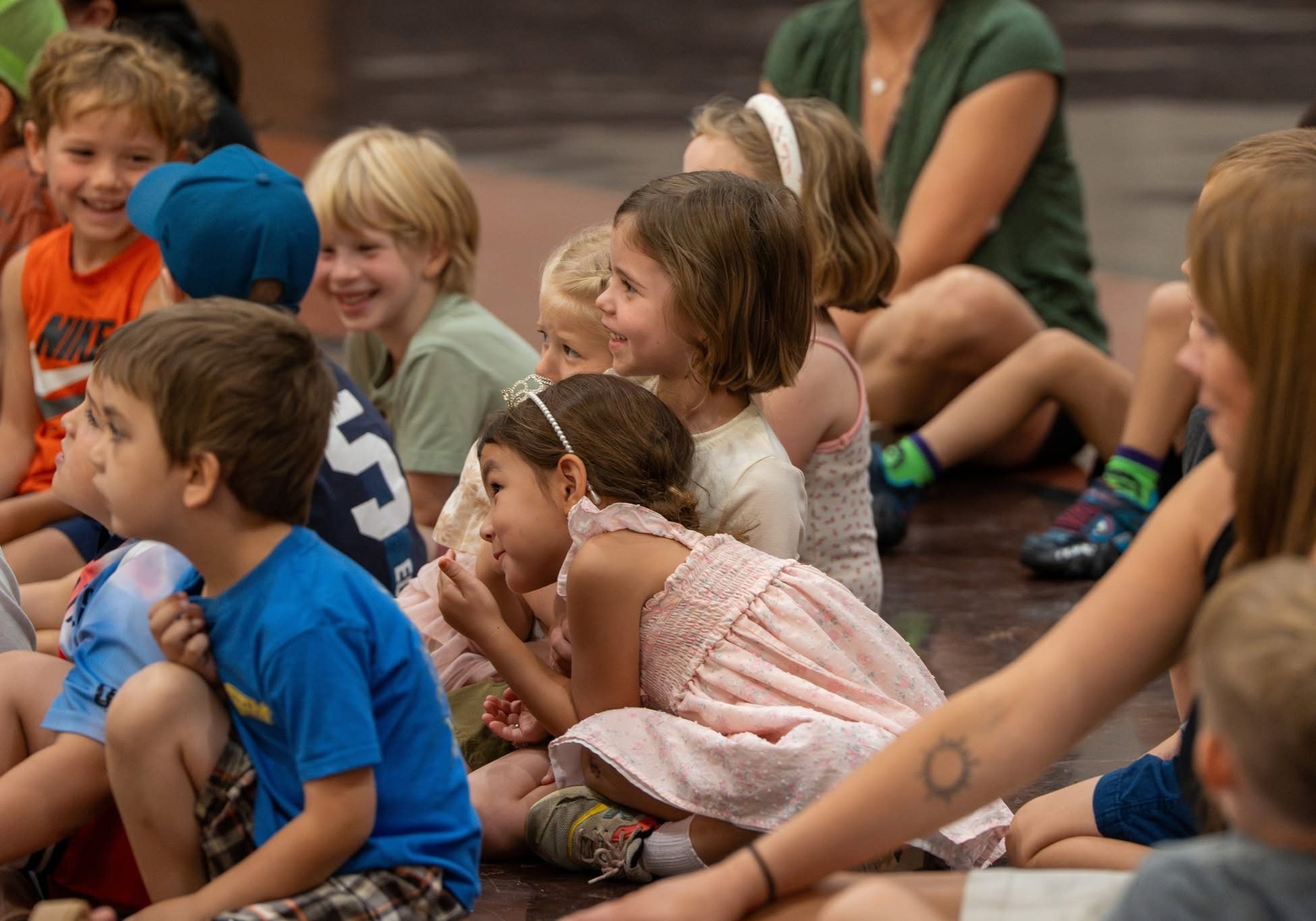 group of kids sitting down
